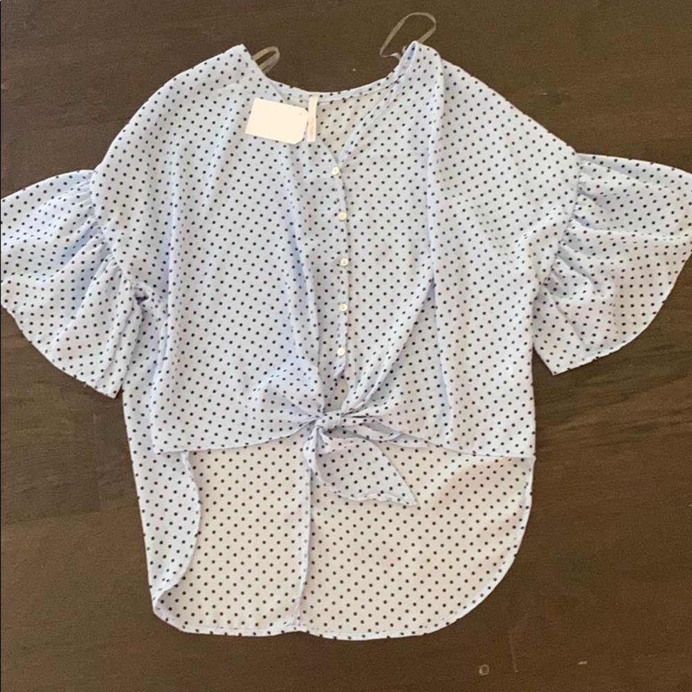 Flirty blue polka dot top